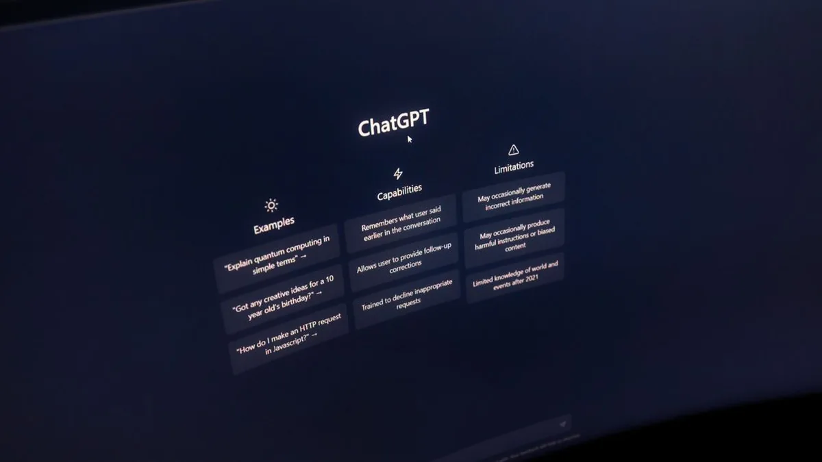 A software developer configuring a visual chatbot workflow beside code and API tools (Photo by Matheus Bertelli, Pexels)