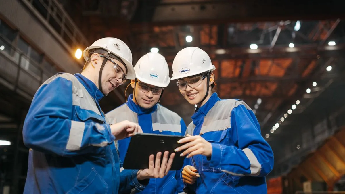 A field technician submitting inspection information through a tablet at a worksite (Photo by Sergey Sergeev, Pexels)