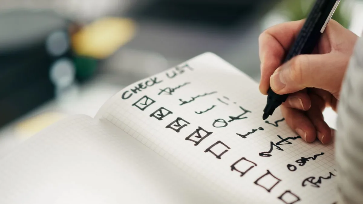 A clean task list where completed rows have a consistent final style that overrides deadline warnings (Photo by Jakub Zerdzicki, Pexels)
