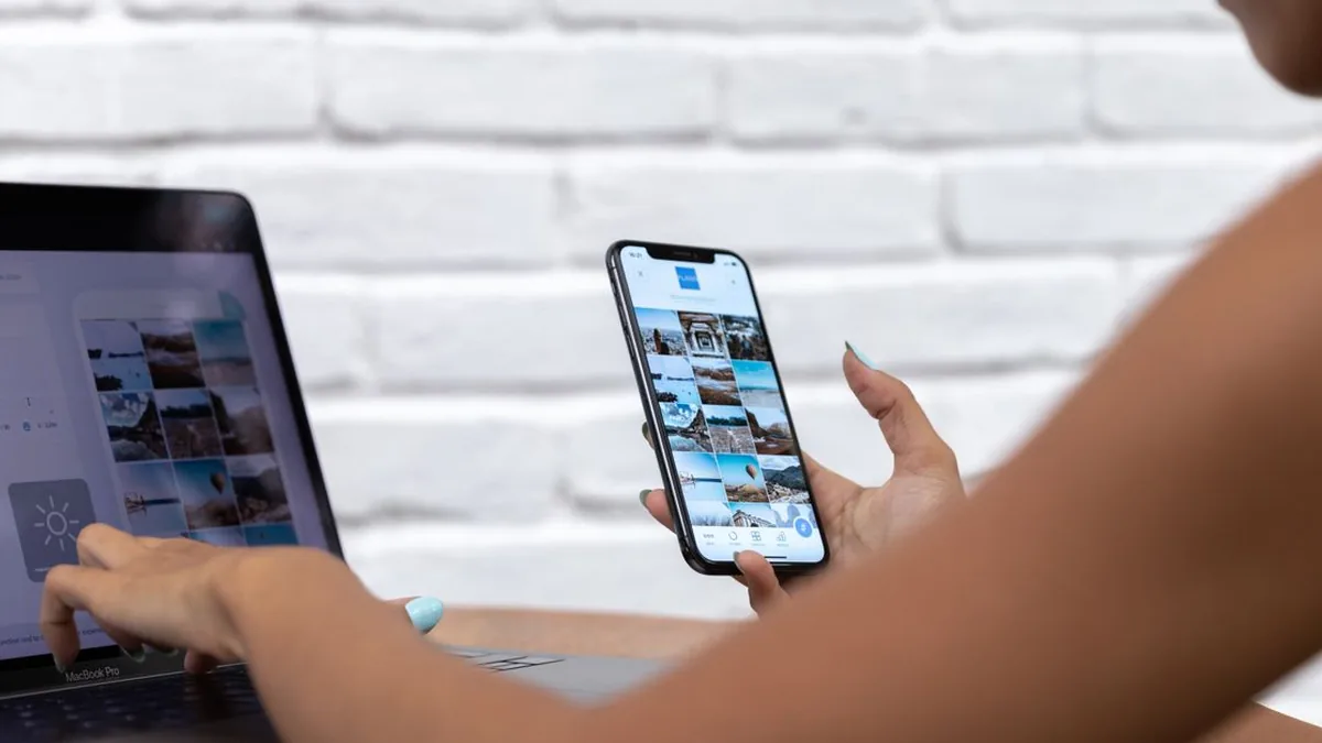 A creator reviewing the same prepared post across several social applications (Photo by Plann, Pexels)