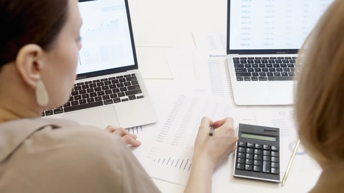 A spreadsheet receiving additional task rows while formulas and formatting continue into the new records (Photo by Artem Podrez, Pexels)