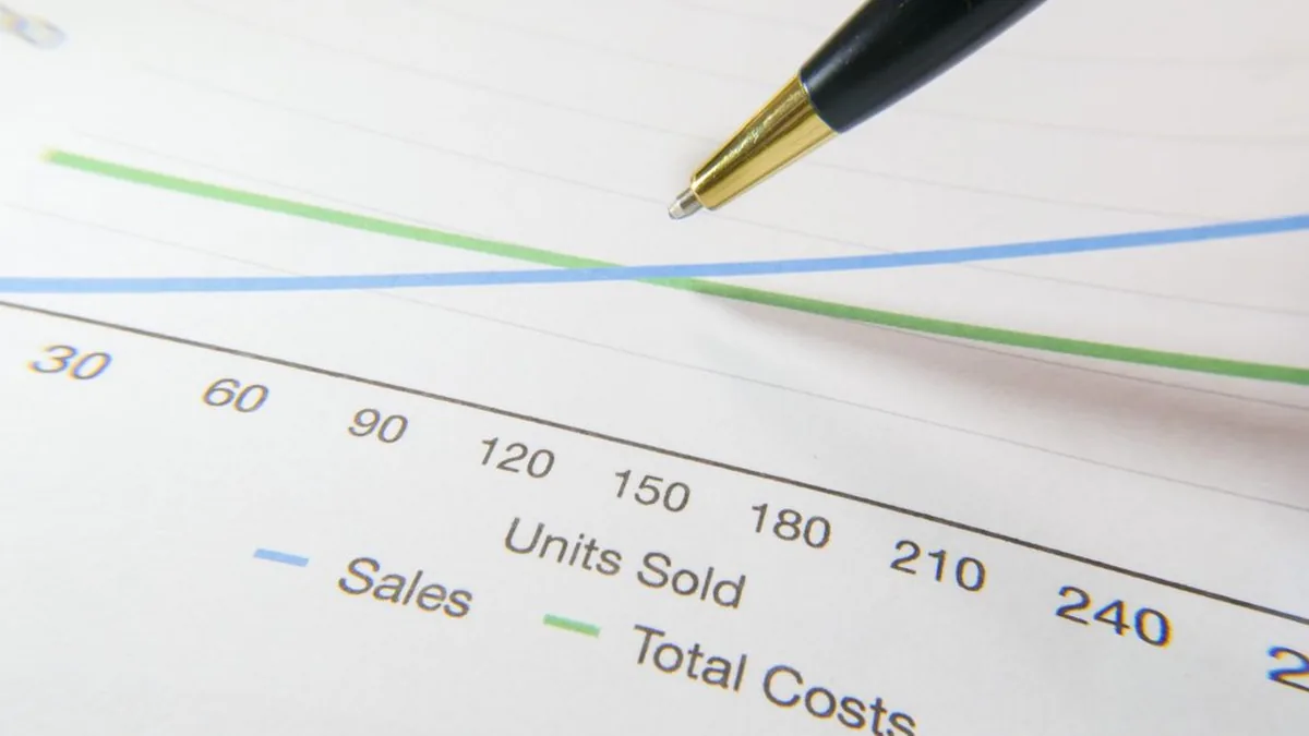 A finance or operations team calculating software, messaging, hosting, and support costs (Photo by Kindel Media, Pexels)