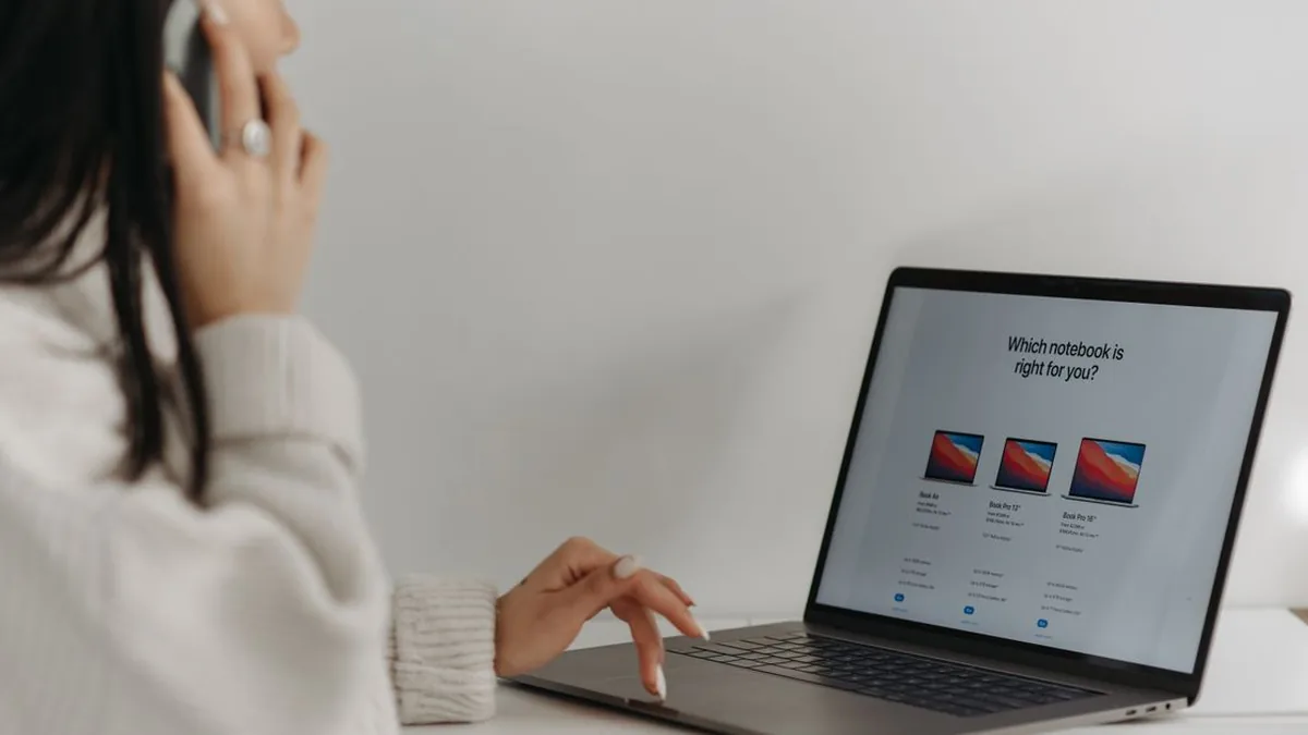 A buyer comparing several software plans and feature columns on a laptop (Photo by Pavel Danilyuk, Pexels)