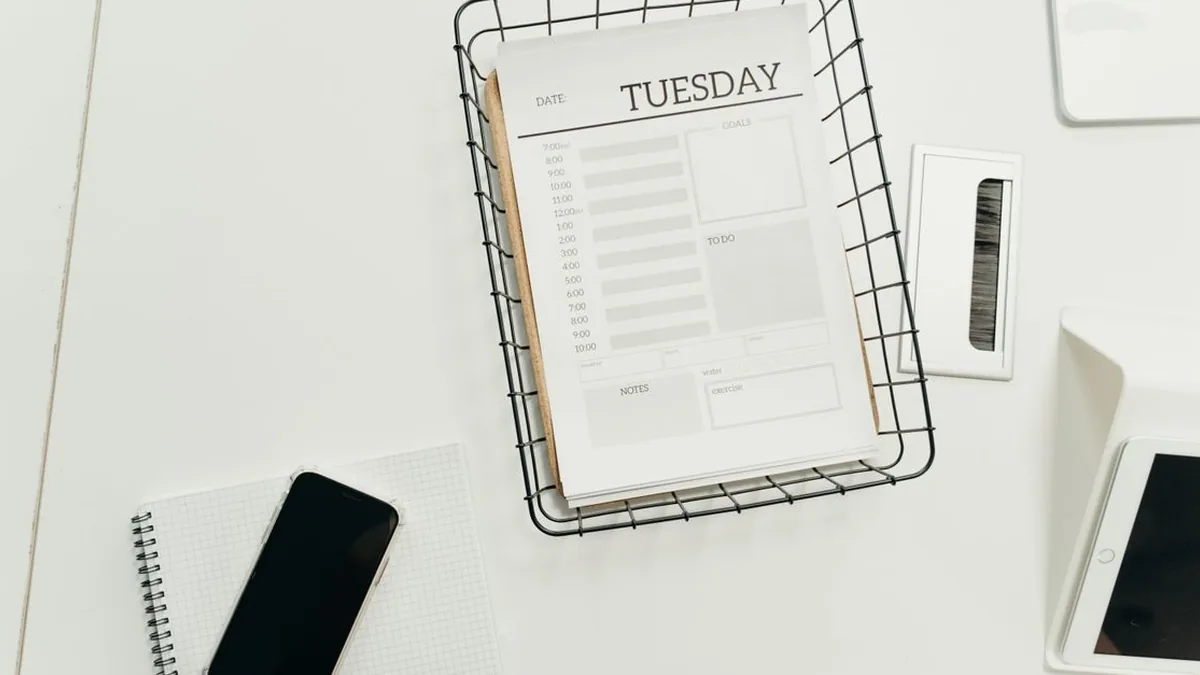 A customer-service employee managing messages arriving through a shared business inbox.