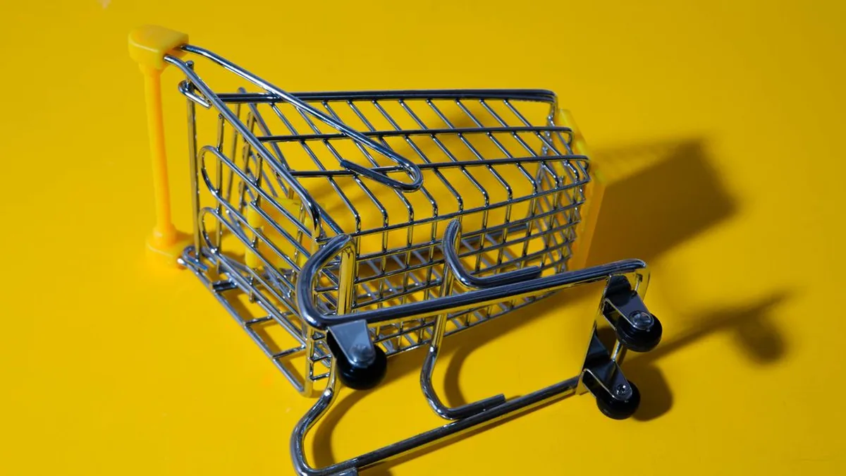 An ecommerce operator reviewing an abandoned-cart workflow across email, SMS, and push notifications (Photo by Sergey  Meshkov, Pexels)