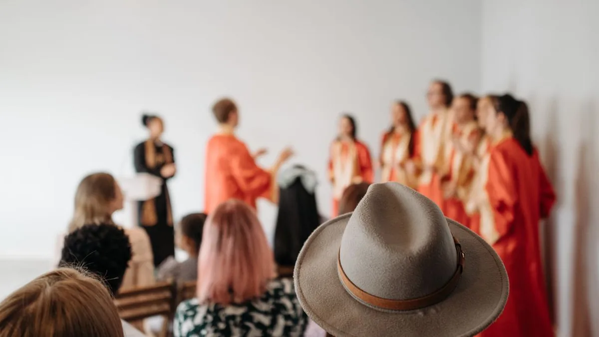 A ministry staff member listening attentively and calmly during a sensitive visitor conversation (Photo by Pavel Danilyuk, Pexels)